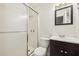 Clean bathroom with shower, toilet and dark brown vanity at 19 Roving Hills Cir, Cartersville, GA 30121