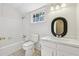 Clean bathroom with a bathtub, toilet and vanity at 19 Roving Hills Cir, Cartersville, GA 30121