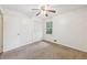 Bedroom with ceiling fan and window at 19 Roving Hills Cir, Cartersville, GA 30121