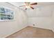 Simple bedroom with wood floors and a window at 19 Roving Hills Cir, Cartersville, GA 30121