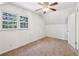 Bright bedroom featuring carpet and a ceiling fan at 19 Roving Hills Cir, Cartersville, GA 30121
