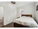 Bright bedroom with wood floors and a double bed at 1018 Westmont Sw Rd, Atlanta, GA 30311