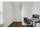 Bright home office features wood floors and a window with blinds at 1018 Westmont Sw Rd, Atlanta, GA 30311