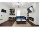 Spacious living room with hardwood floors, fireplace and large artwork at 1018 Westmont Sw Rd, Atlanta, GA 30311