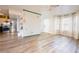 Open living space with hardwood floors and access to kitchen at 592 Waynes Ct, Atlanta, GA 30354