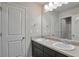 Bathroom with double vanity and dark wood cabinets at 157 Parkview Place Dr, Mcdonough, GA 30253