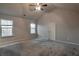 Spacious bedroom with carpeted floors and two windows at 157 Parkview Place Dr, Mcdonough, GA 30253