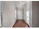 Bright foyer with wood flooring and neutral walls at 157 Parkview Place Dr, Mcdonough, GA 30253