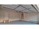 Attached garage with an open overhead door and ample space at 157 Parkview Place Dr, Mcdonough, GA 30253