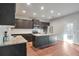 Modern kitchen with granite countertops and stainless steel appliances at 157 Parkview Place Dr, Mcdonough, GA 30253