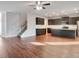 Modern kitchen with dark cabinets, granite counters, and stainless steel appliances at 157 Parkview Place Dr, Mcdonough, GA 30253