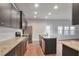 Spacious kitchen with an island and plenty of cabinet space at 157 Parkview Place Dr, Mcdonough, GA 30253
