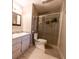 Updated bathroom with double vanity and walk-in shower at 2341 Amberbrook Sw Dr, Conyers, GA 30094