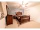 Bedroom with a sleigh bed and ceiling fan at 2341 Amberbrook Sw Dr, Conyers, GA 30094