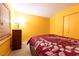 Bedroom with a dark brown upholstered bed and dresser at 2341 Amberbrook Sw Dr, Conyers, GA 30094