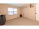 Spacious bedroom with neutral carpeting and double closets at 2341 Amberbrook Sw Dr, Conyers, GA 30094