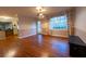 Bright dining room with hardwood floors and view of backyard at 2341 Amberbrook Sw Dr, Conyers, GA 30094