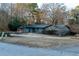 Exterior of the house with a view of the front yard and street at 2341 Amberbrook Sw Dr, Conyers, GA 30094
