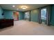 Bright living room featuring hardwood floors and large windows at 2341 Amberbrook Sw Dr, Conyers, GA 30094