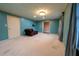 Spacious living room with hardwood floors and a cozy seating area at 2341 Amberbrook Sw Dr, Conyers, GA 30094