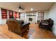 Living room boasts built-in shelves and a stone fireplace at 2341 Amberbrook Sw Dr, Conyers, GA 30094