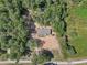 Overhead view of a single-story house on a tree-lined property at 248 Billy Bullock Rd, Dallas, GA 30157