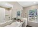 Virtually staged bathroom with double vanity and shower at 248 Billy Bullock Rd, Dallas, GA 30157