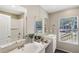 Modern bathroom boasts double vanity and a large window at 248 Billy Bullock Rd, Dallas, GA 30157