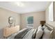 Virtually staged bedroom with a queen-size bed and dresser at 248 Billy Bullock Rd, Dallas, GA 30157