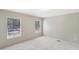 Bright bedroom with neutral carpeting and two windows at 248 Billy Bullock Rd, Dallas, GA 30157