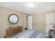 Spacious bedroom with neutral walls and stylish decor at 248 Billy Bullock Rd, Dallas, GA 30157