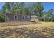 Single-story home with gray siding and a wooden deck at 248 Billy Bullock Rd, Dallas, GA 30157