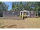 Single-story home with gray siding and a wooden deck at 248 Billy Bullock Rd, Dallas, GA 30157