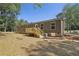 Brown mobile home with deck and steps at 248 Billy Bullock Rd, Dallas, GA 30157