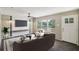 Bright living room with comfy seating and large window at 248 Billy Bullock Rd, Dallas, GA 30157