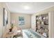 Virtually staged home office with built-in shelving and desk at 248 Billy Bullock Rd, Dallas, GA 30157