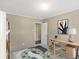 Virtually staged home office with a desk and chair at 248 Billy Bullock Rd, Dallas, GA 30157