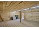 Workshop with wood walls, shelving, and a small refrigerator at 248 Billy Bullock Rd, Dallas, GA 30157