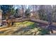 Large backyard with wooden playset and fence at 1429 Wood Iris Ln, Lawrenceville, GA 30045