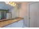 Bathroom with granite countertop and single sink at 1429 Wood Iris Ln, Lawrenceville, GA 30045