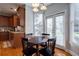 Charming breakfast nook with a table and four chairs, near the kitchen at 1429 Wood Iris Ln, Lawrenceville, GA 30045