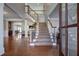 Two-story foyer with hardwood floors and curved staircase at 1429 Wood Iris Ln, Lawrenceville, GA 30045