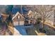 Brick house with two-car garage and landscaping at 1429 Wood Iris Ln, Lawrenceville, GA 30045