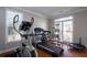 Home gym with treadmill, elliptical, and cat tree at 1429 Wood Iris Ln, Lawrenceville, GA 30045