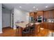 Eat-in kitchen with granite countertops and stainless steel appliances at 1429 Wood Iris Ln, Lawrenceville, GA 30045
