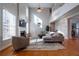 Spacious living room with hardwood floors, fireplace, and high ceilings at 1429 Wood Iris Ln, Lawrenceville, GA 30045