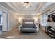Main bedroom featuring a sitting area and ample natural light at 1429 Wood Iris Ln, Lawrenceville, GA 30045
