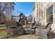 Cozy patio with wicker furniture, perfect for outdoor relaxation at 1429 Wood Iris Ln, Lawrenceville, GA 30045