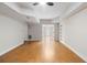 Basement featuring wood floors, neutral walls, recessed lighting and glass doors at 6020 Cochran Mill Rd, Chattahoochee Hills, GA 30268