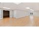 Large, finished basement with light wood flooring and ample natural light, offering versatile living space at 6020 Cochran Mill Rd, Chattahoochee Hills, GA 30268